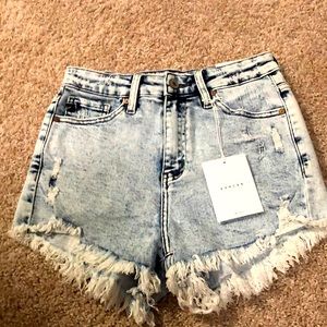 These are KanCan,Distressed jean shorts, size S (24) Blue Acid wash.